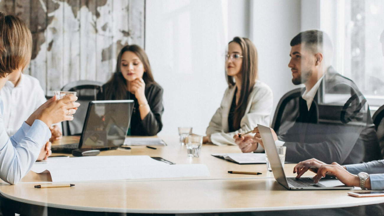 Group of people working out business plan in an office